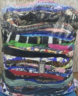 Used branded diolhem dresses wholesale Italy